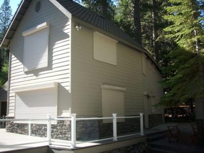 Protect Vacant Cabins from Unwanted Intruders With Exterior Rolling Shutters Image